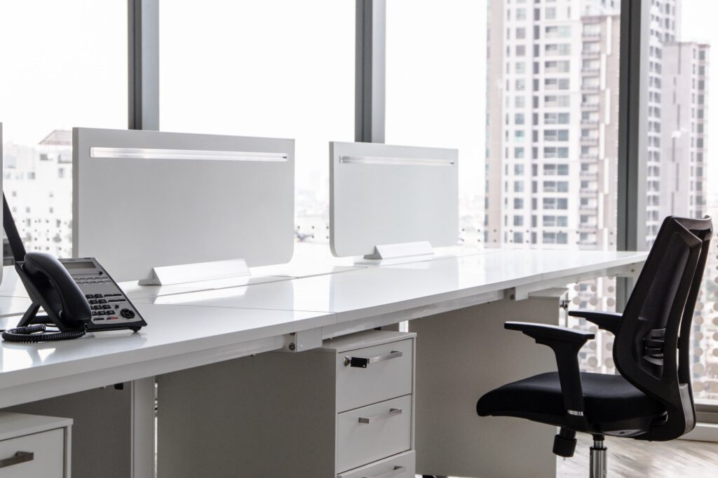 A rental modern office with black and white design in a tall building at the city center